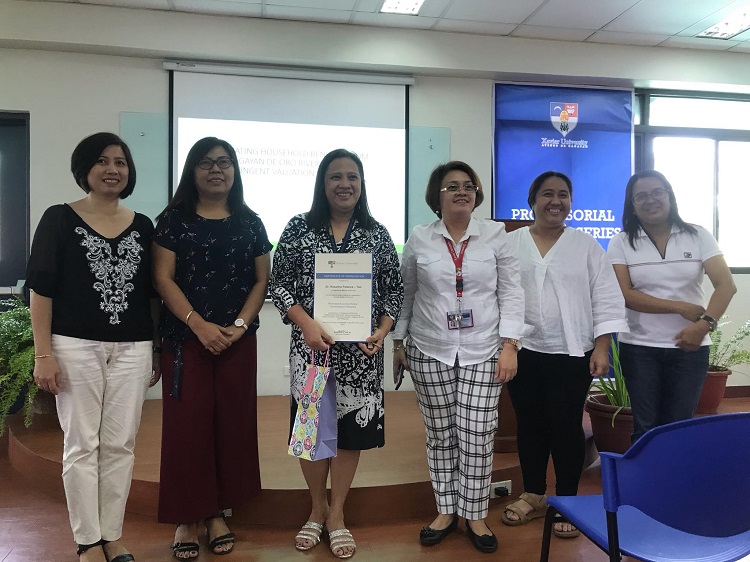 a certificate of appreciation presented to Dr. Tan