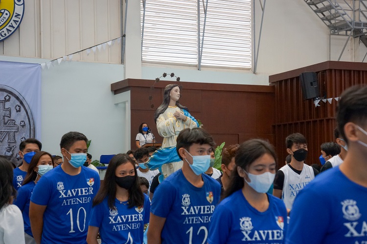 SHS students join the procession of Our Lady of the Immaculate Conception